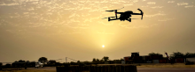 Drone flying over Mali at night